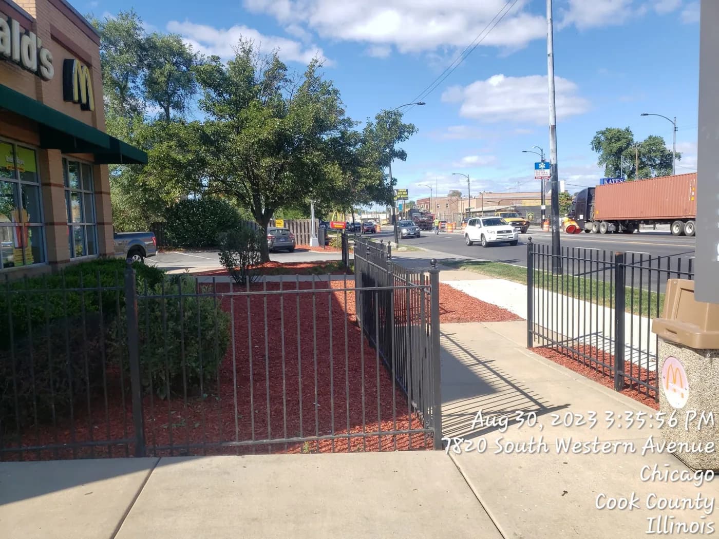 Commercial frontage beds topped with fresh red mulch