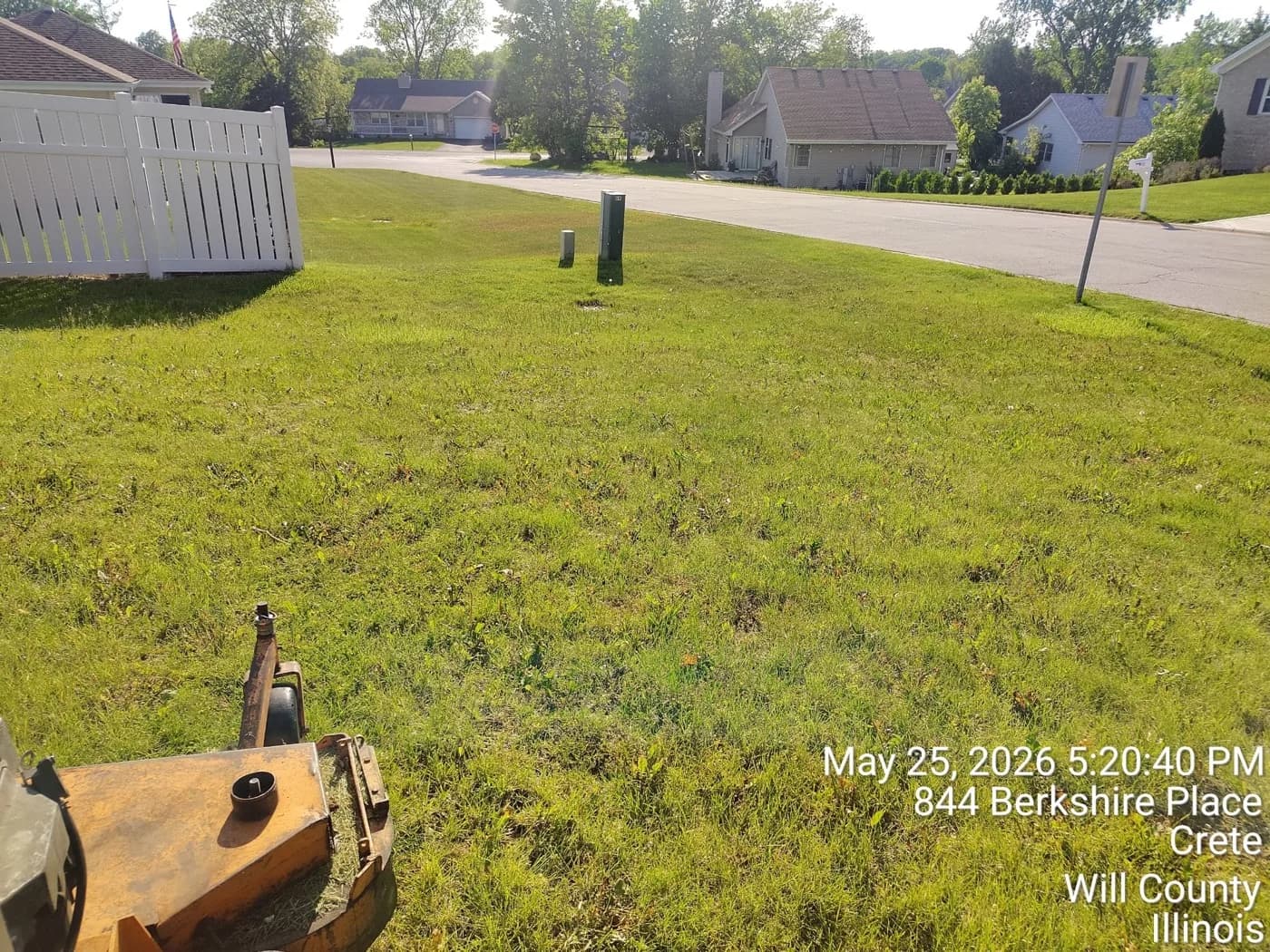 Corner lot mowed out to the parkway on a mowing route